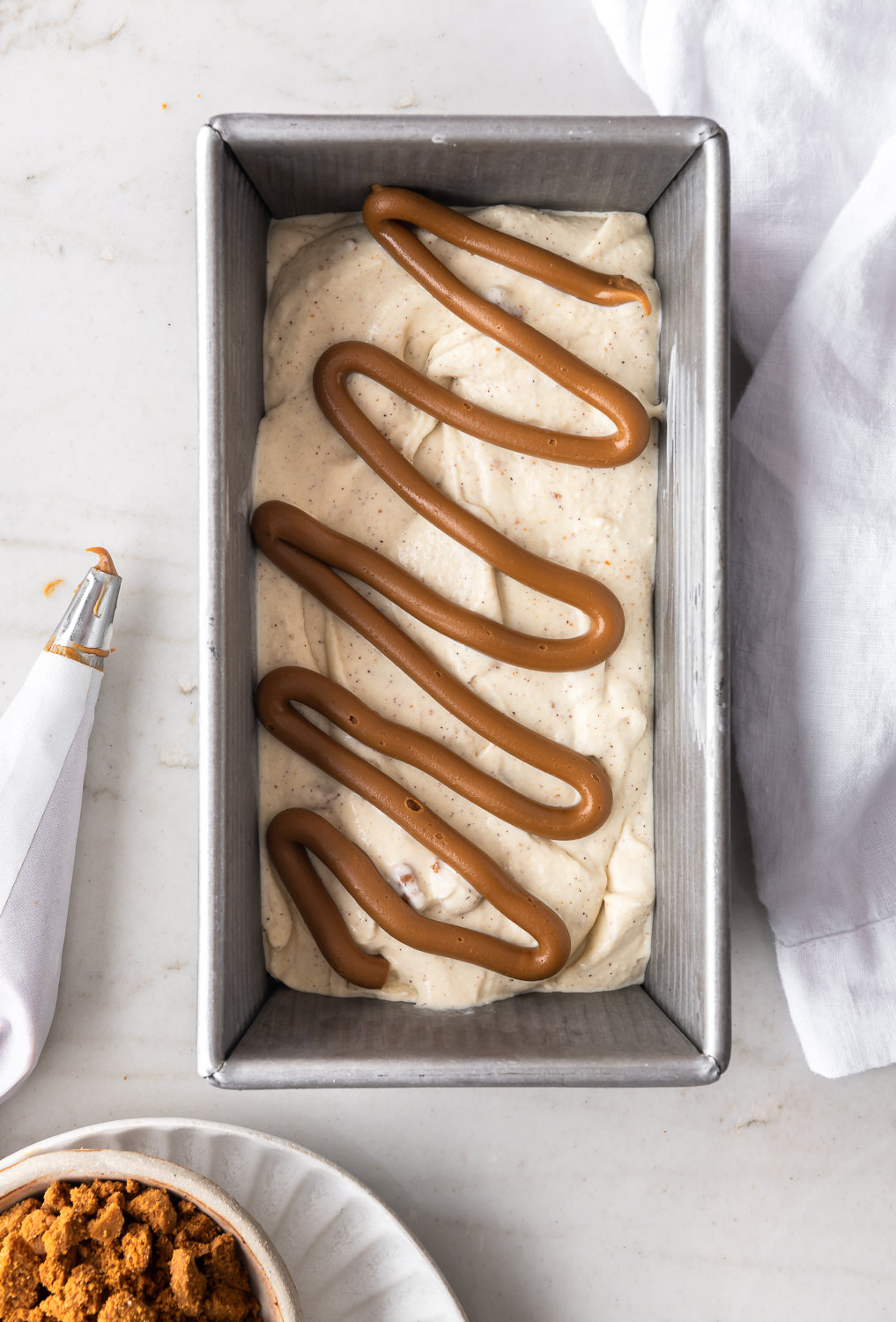 swirling cookie butter in ice cream