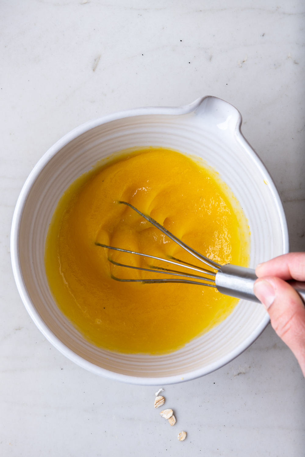 whisking egg yolks and sugar