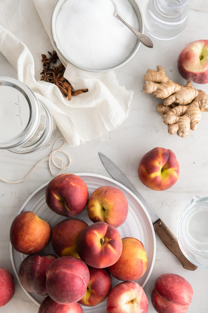 peaches, ginger, cinnamon, star anise, sugar and vinegar for sweet pickled peaches