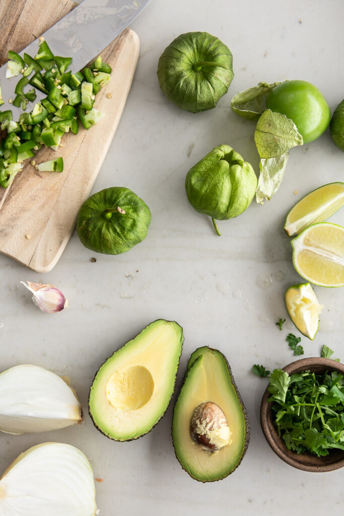 avocados, tomatillos, cilantro, serrano peppers, onion, garlic