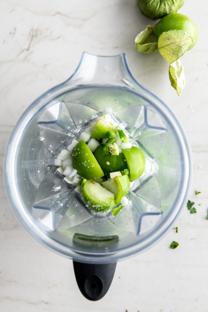 blending tomatillos and onion