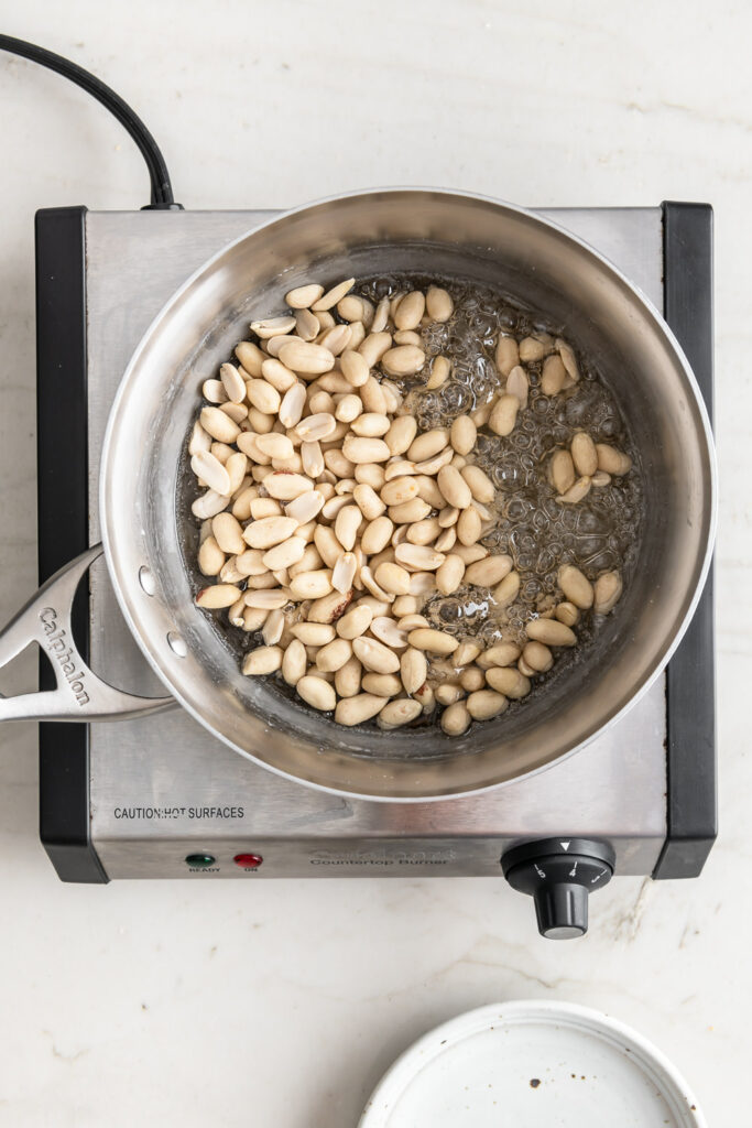 3_stir in raw blanched peanuts
