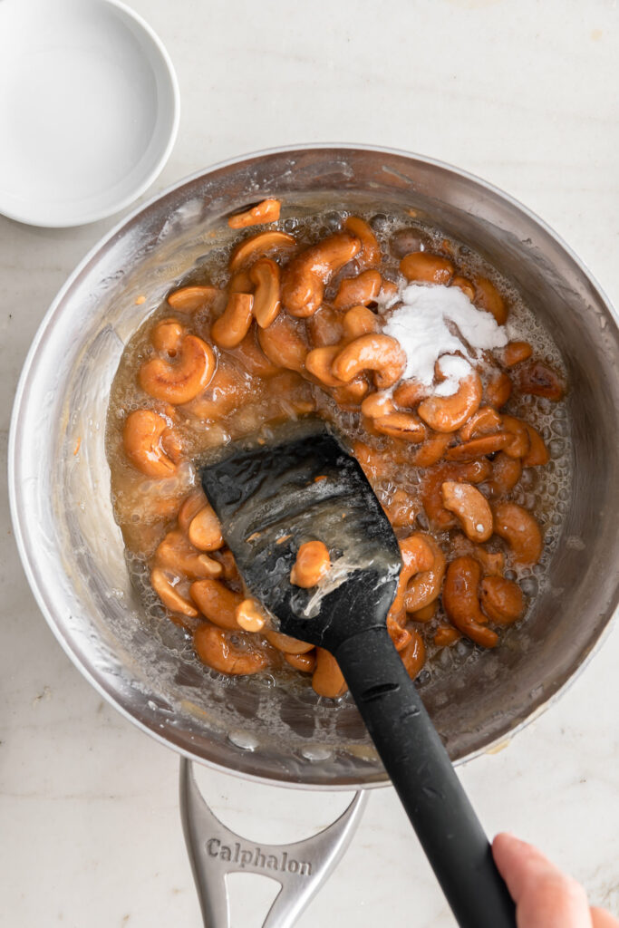 4_adding baking soda to cashew brittle