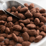 chocolate covered almonds with cocoa