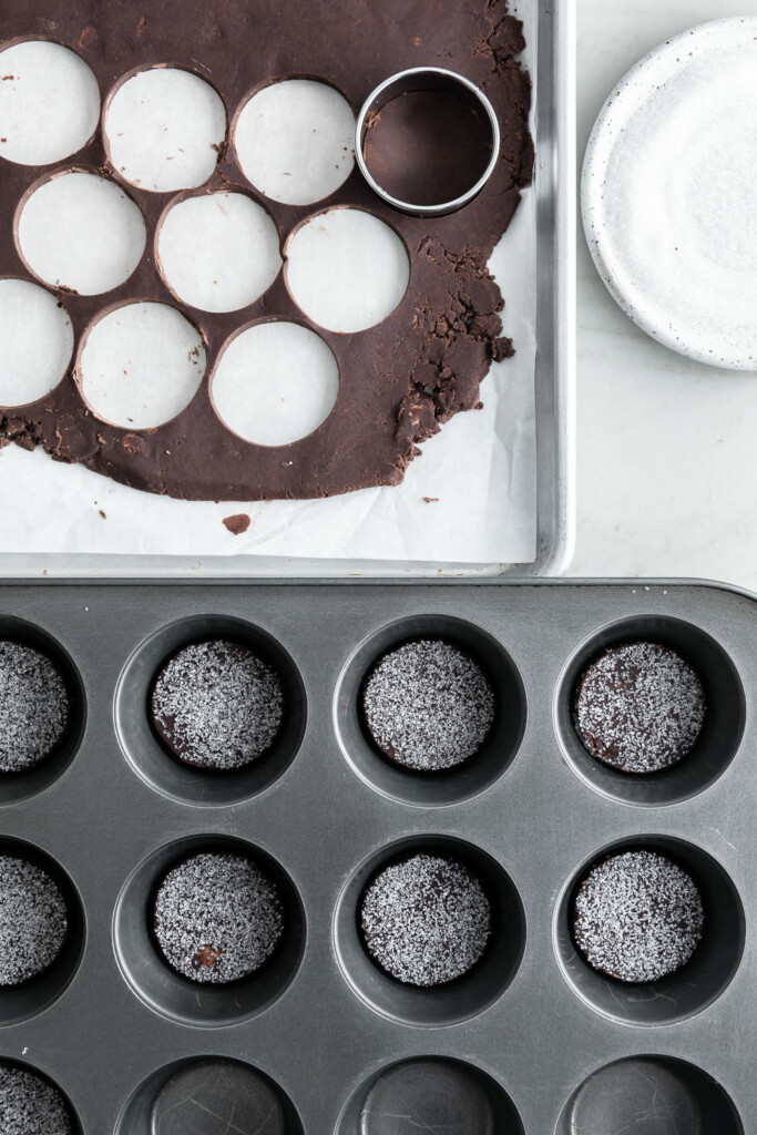 6_cut chocolate shortbread cookies into circles, coat in sugar, bake in muffin tin