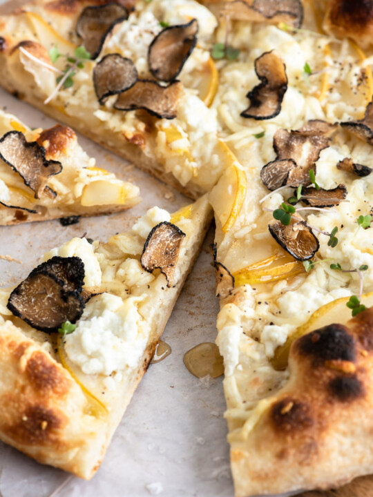 truffle on pizza with pears and ricotta