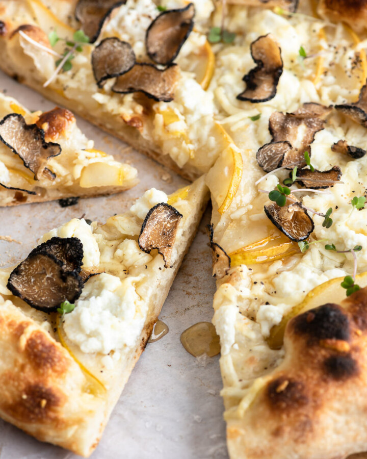 truffle on pizza with pears and ricotta