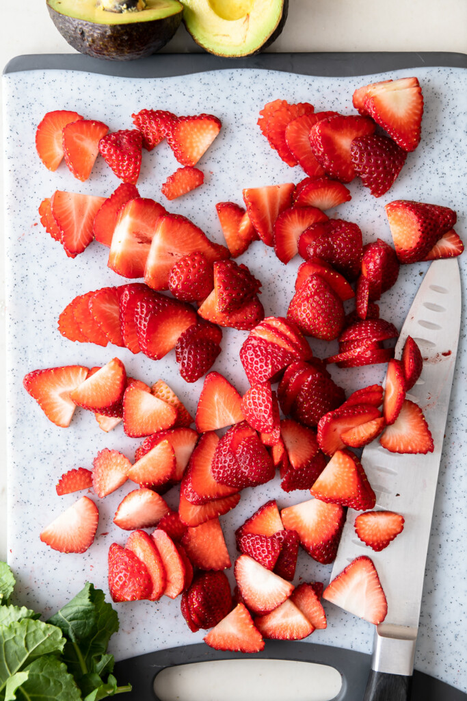 2_slice strawberries, toss with kale and dressing