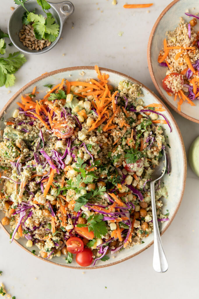 3_toss the quinoa, corn, carrots, cabbage, cherry tomatoes, avocado, roasted chickpeas, and jalapeno ranch