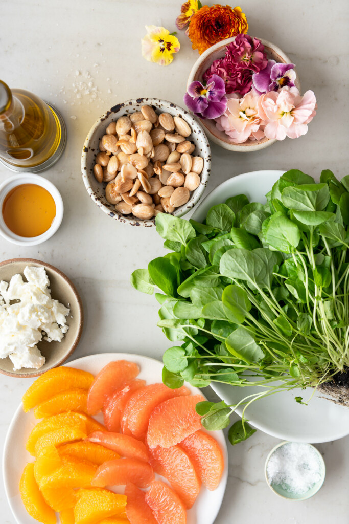 ingredients_watercress, goat cheese, almonds, edible flowers, oranges, grapefruit